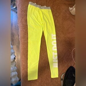 Nike Neon Yellow Leggings
Make a bold statement with color